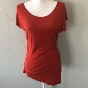 Asymmetrical burnt orange top